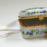 Blue porcelain box, rosary inside. Many shapes.