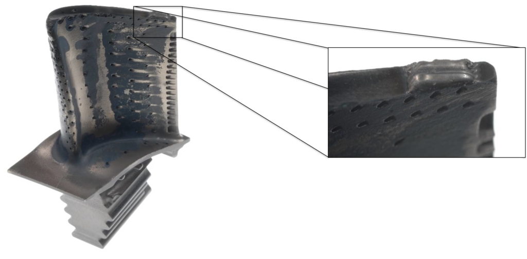 Cladding on a turbine blade tip