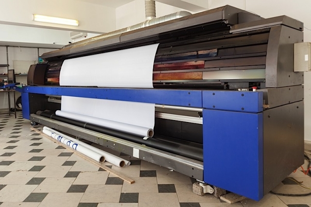 Big Professional Printing Machine In Printing House Photo courtesy of BigStock/dechevm