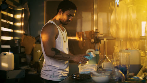 man operating a makeshift meth lab