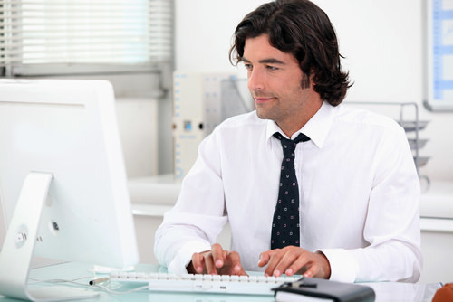 man working on computer