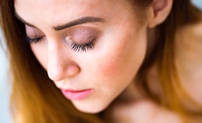 Beautiful woman with eyes closed.