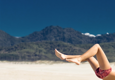 Long skinny legs on a beach
