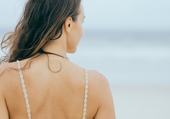 Back of a woman on a beach