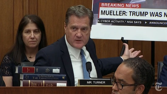 Mike Turner reading headlines