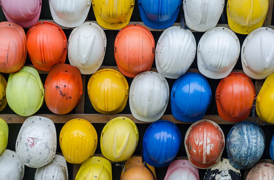 different color construction helmets