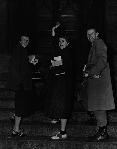 Three students on the steps of Administration Building, now College Hall, 1960.