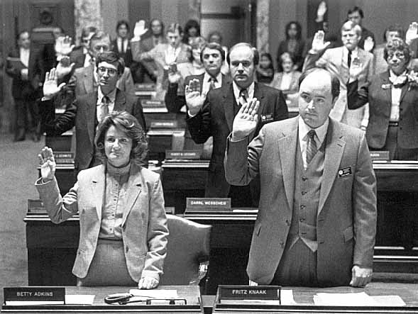 Members of the Senate standing to take the oath of office at the beginning of the 1983 session.