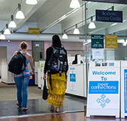 Image of two students walking into the peer connections room in Clark Hall.