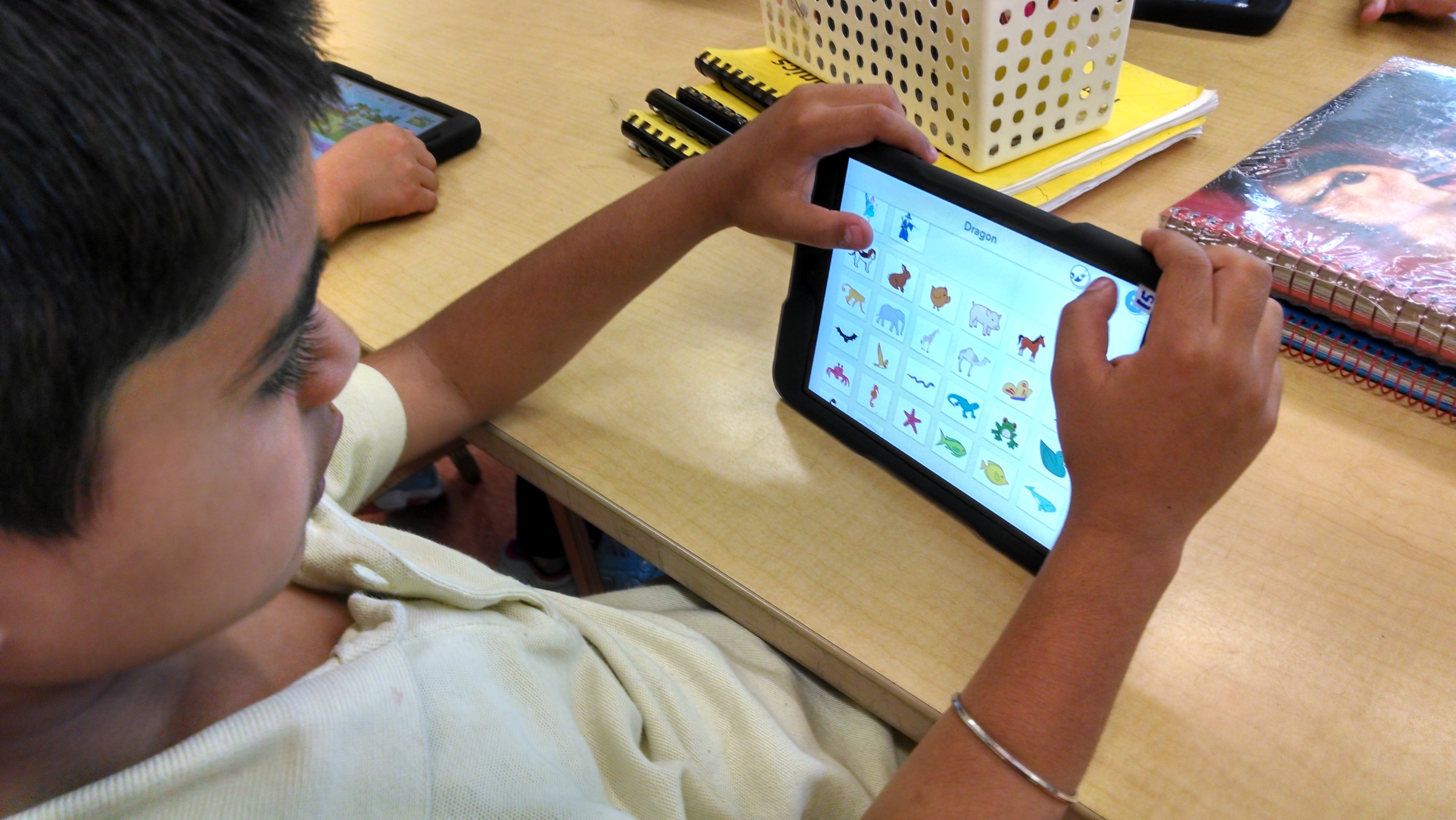 Student using robotics program on iPad