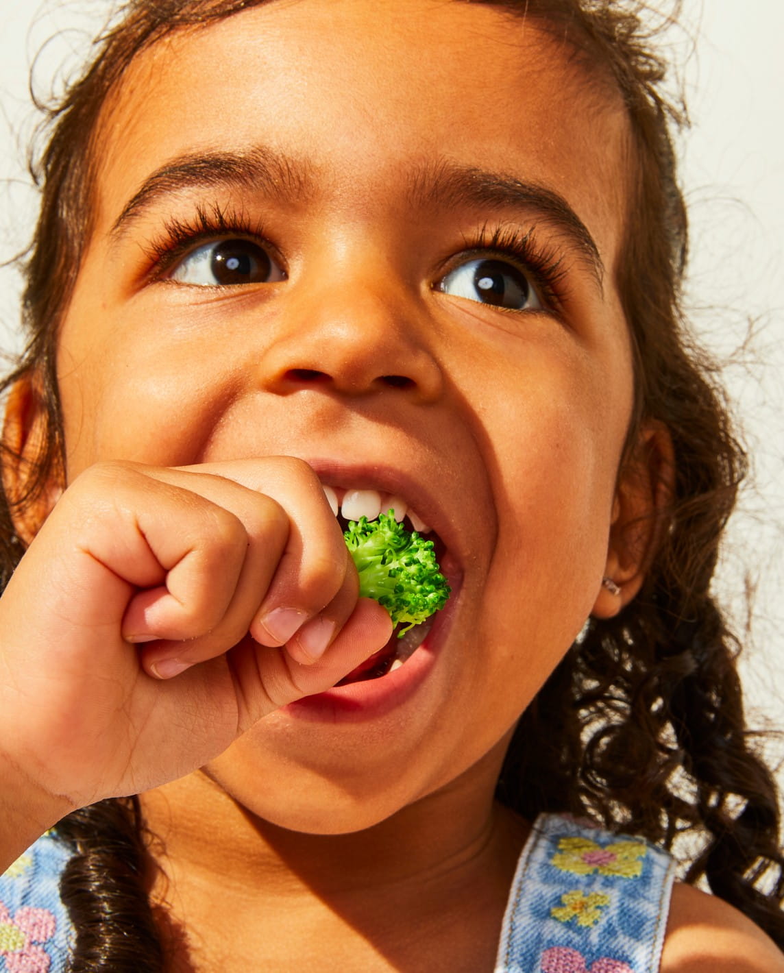 A close-up of vibrant pink baby food puree, showcasing fresh organic ingredients.