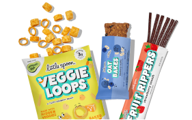 A variety of Little Spoon snacks, including a bag of Veggie Loops, an Oat Bar, and a Fruit Ripper.