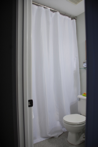 floor to ceiling white shower curtain small bathroom