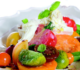 Heirloom Tomato Salad with Brocconcini, Basil, Aged Balsamic Vinegar and Olive Oil