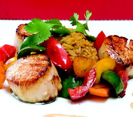 Scallops on Saffron and Molasses Rice
