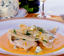 Agnolotti Pasta (Pasta Stuffed with Walnuts, Prunes, Spinach and Gorgonzola, Served with a Squash Sauce Scented with Orange)