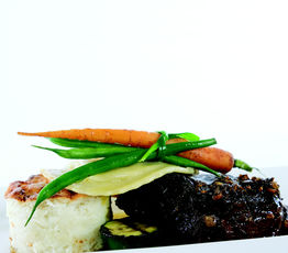 Alberta Beef Tenderloin with Foie Gras Ravioli, Potato Souffle, Porcini Jus
