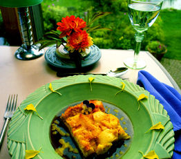 Bread Pudding with Peaches and Warm Rum Sauce