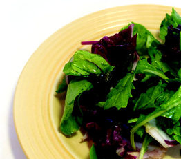 Autumn Greens with Raspberry Vinaigrette and Toasted Pumpkin Seeds