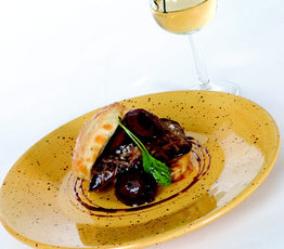 Seared Quebec Foie Gras on a Cheddar Chive Biscuit with Balsamic Glazed Plums