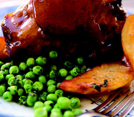 Cider-glazed Ham Hocks with Crispy Roast Potatoes and Minted Peas