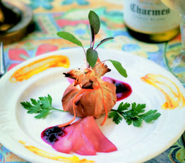Vienne Phyllo-Baked Brie Accompanied by Poached Pears and Simmering Cassis