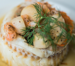 Baked Haddock Stuffed with Shrimp and Scallops and Pernod Cream Sauce