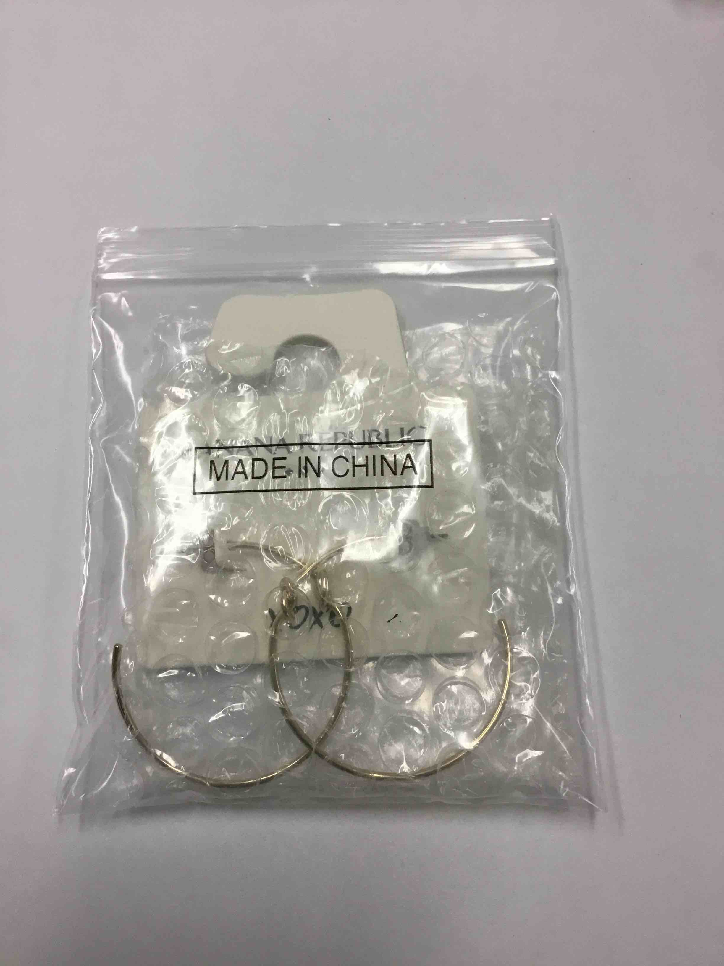 Condition photo showing New/Like New for Banana Republic Silver Hoop Earrings 