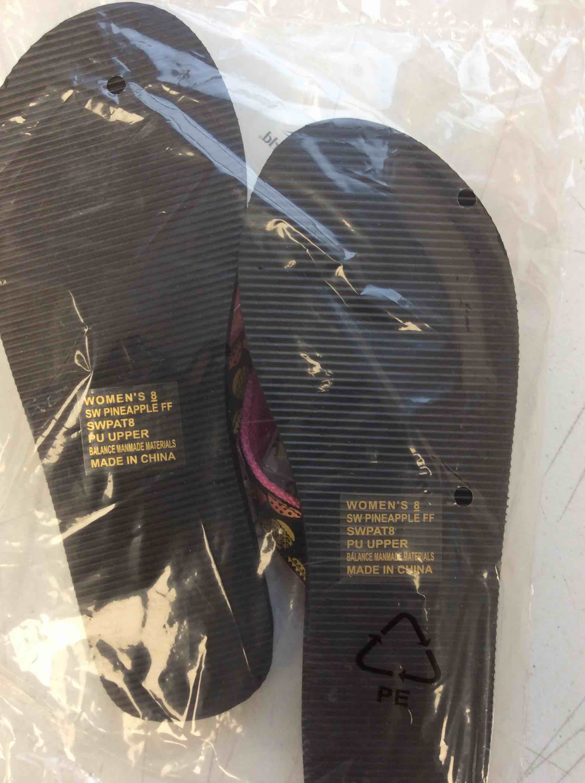 Condition photo showing New/Like New for seaworld sandals with pineapple patters size 8 in women 