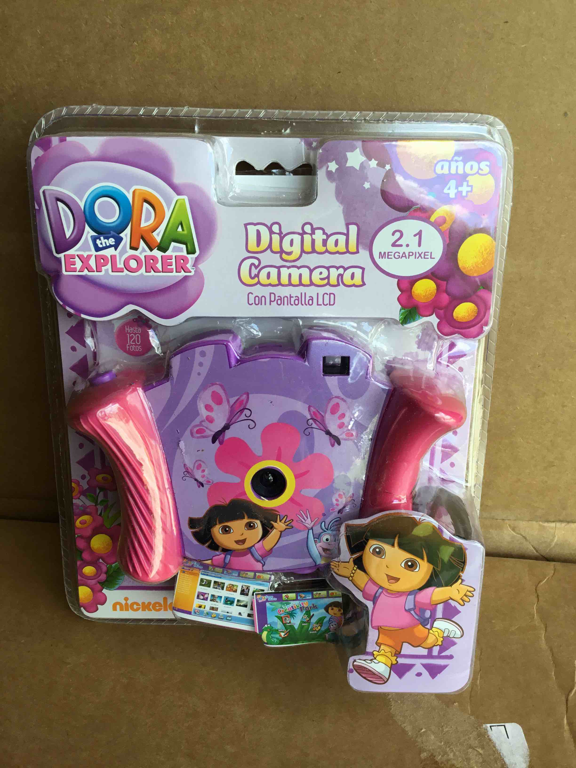 Condition photo showing Brand New for nickelodeon dora the explorer digital camera with 1.4-inch lcd screen - purple