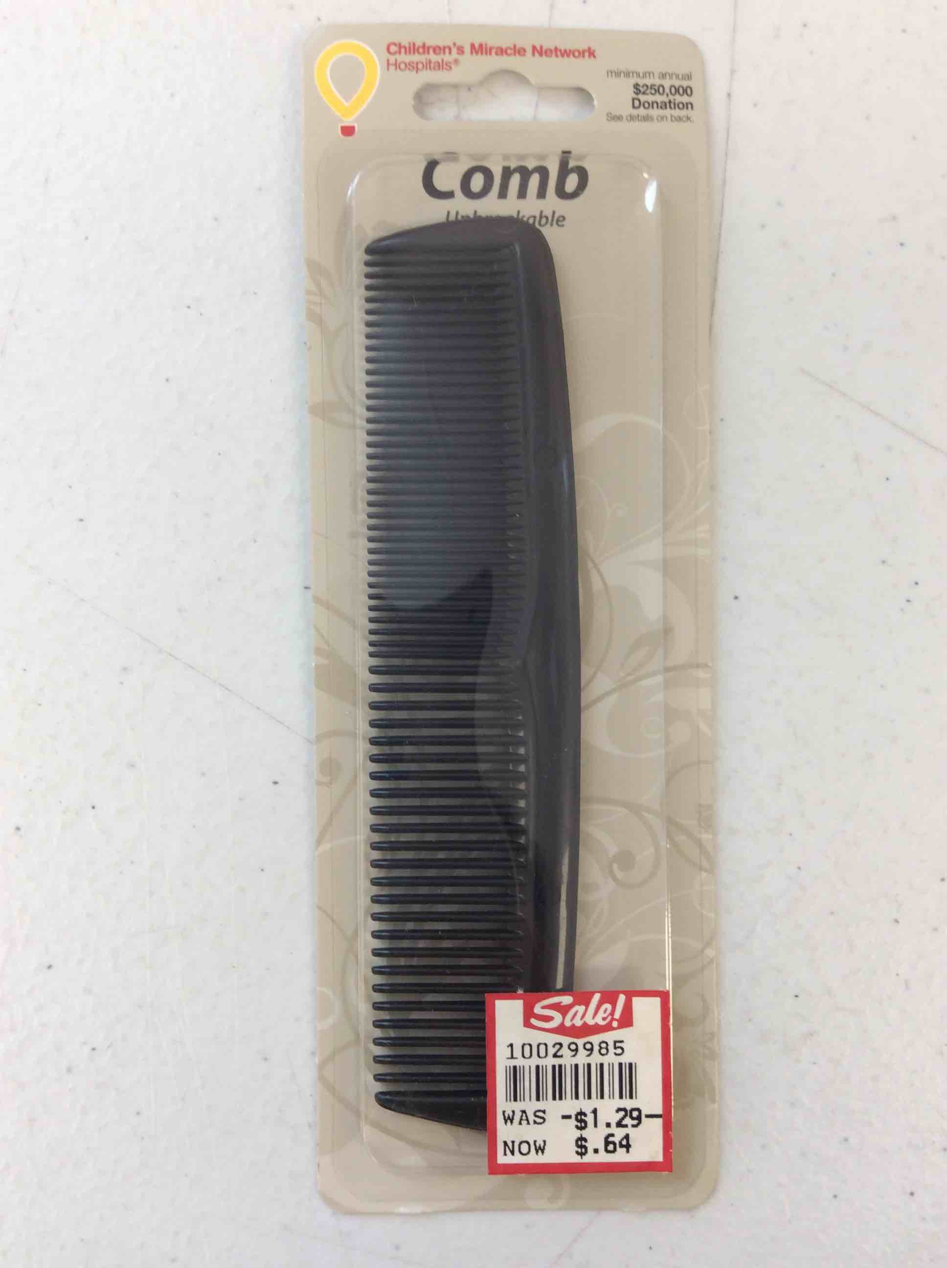 Condition photo showing New/Like New for black comb unbreakable