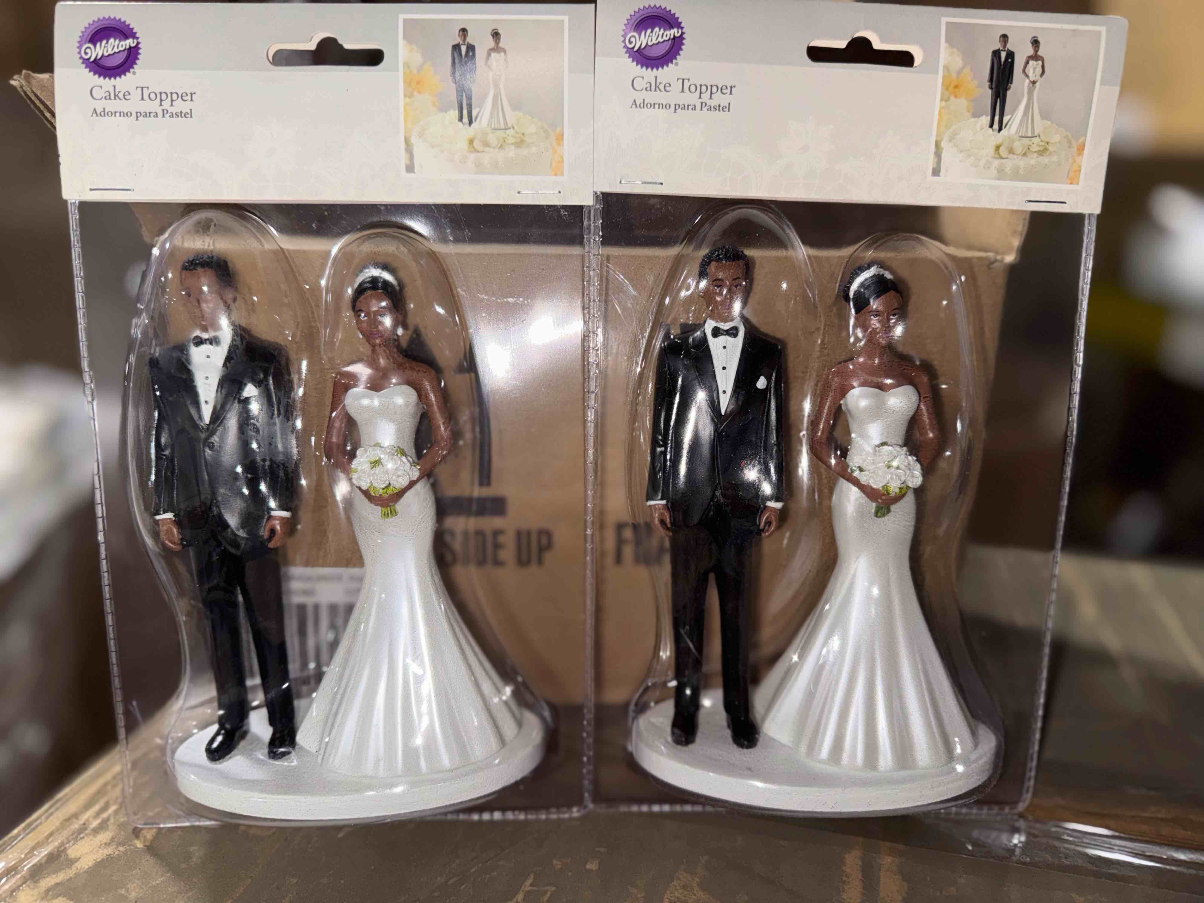 Condition photo showing New/Like New for pack of 2 cake topper bride and groom