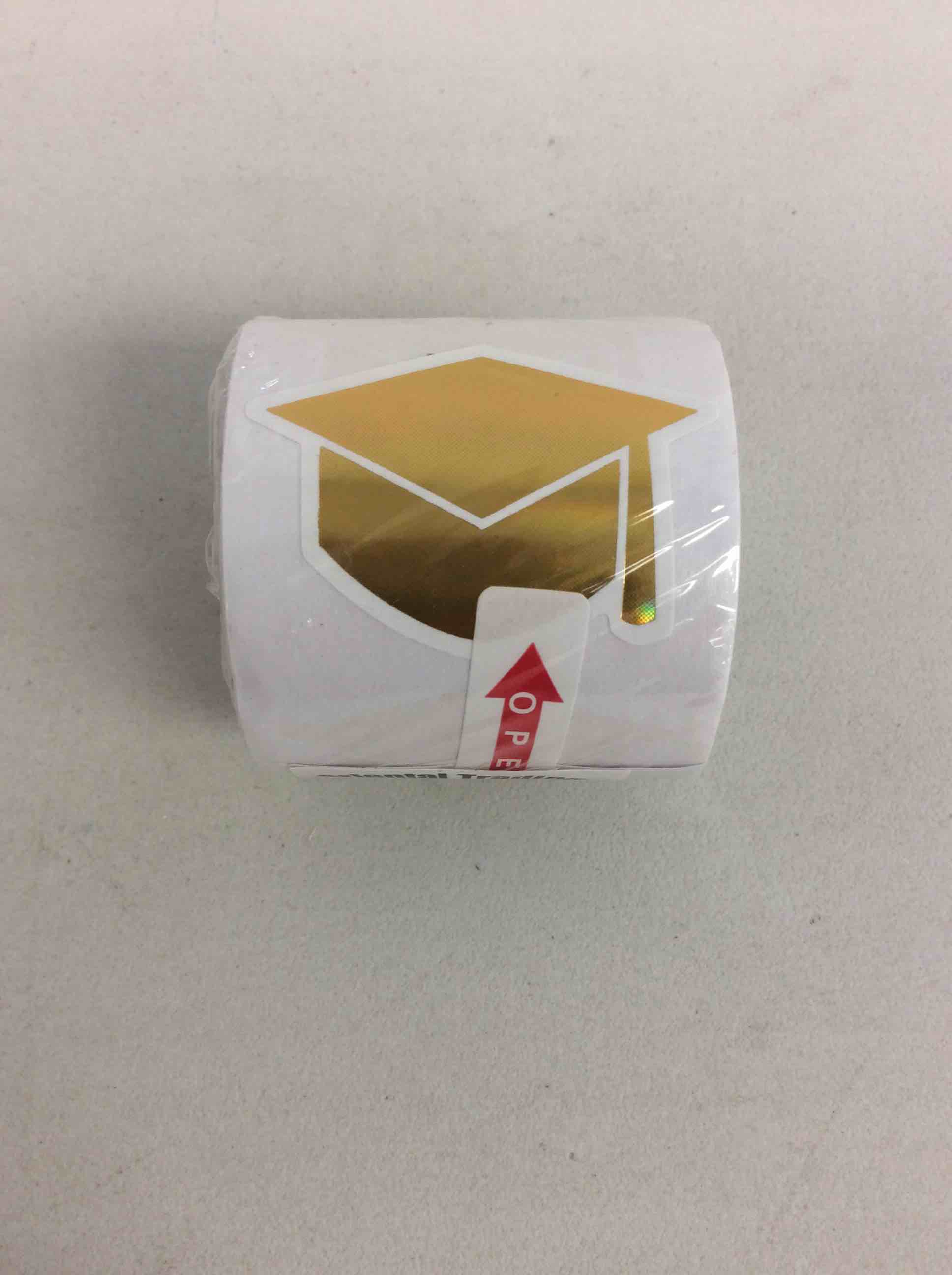 Condition photo showing New/Like New for graduation mortarboard sticker roll – 100 pieces