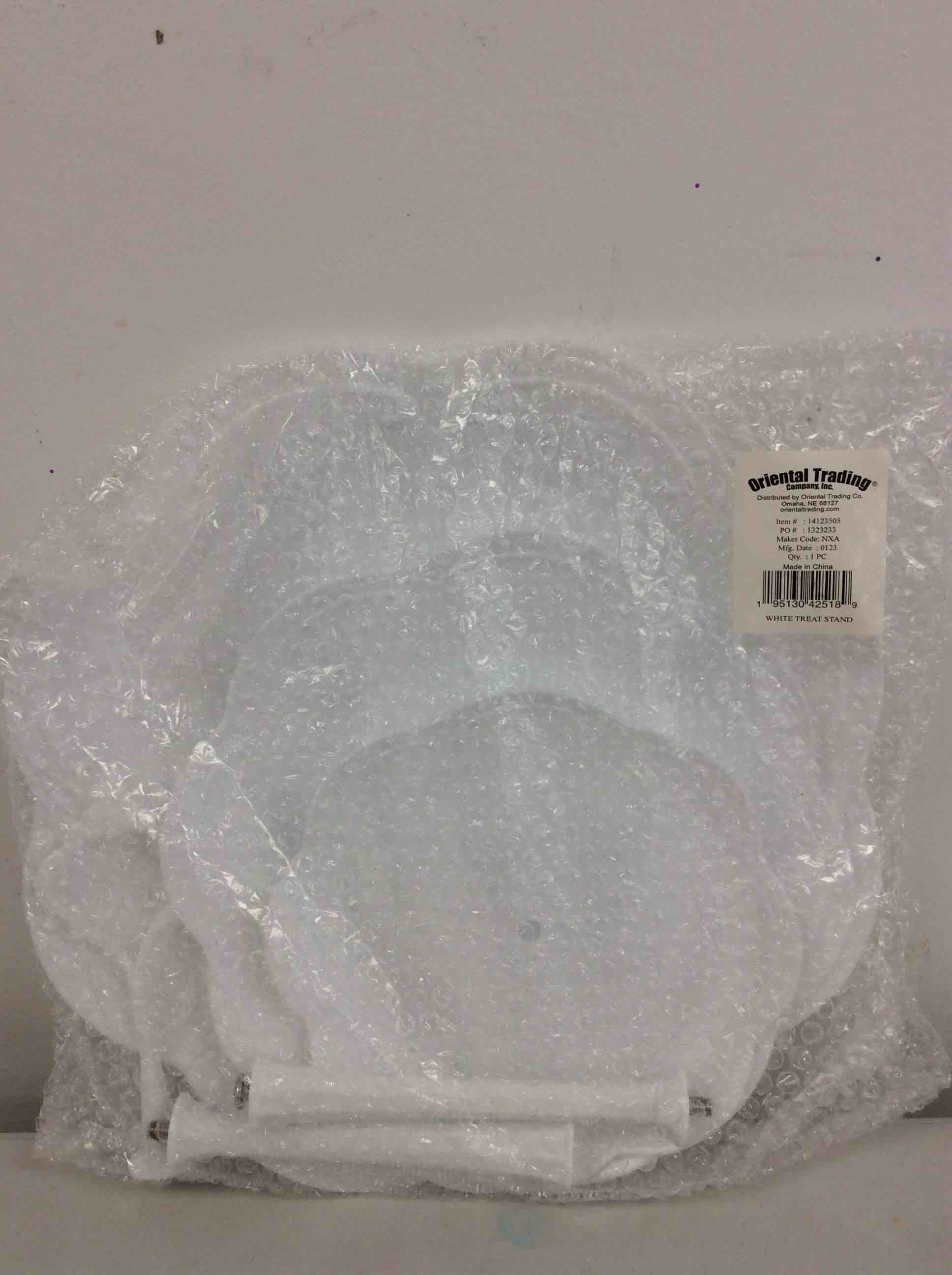 Condition photo showing New/Like New for fun express white tiered treat stand