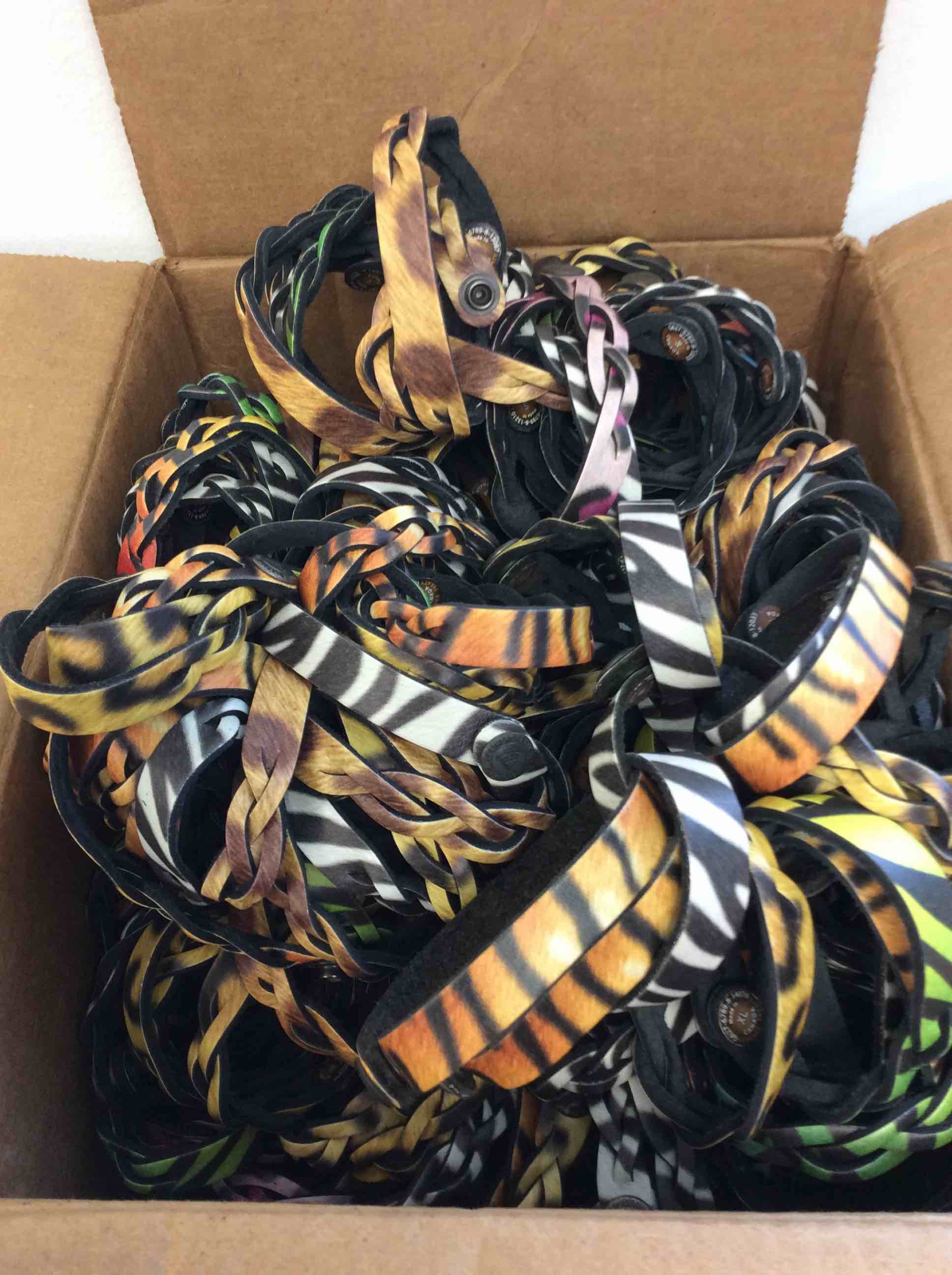 Condition photo showing New/Like New for box of leather treaty assorted bracelets sizes small-extra large 