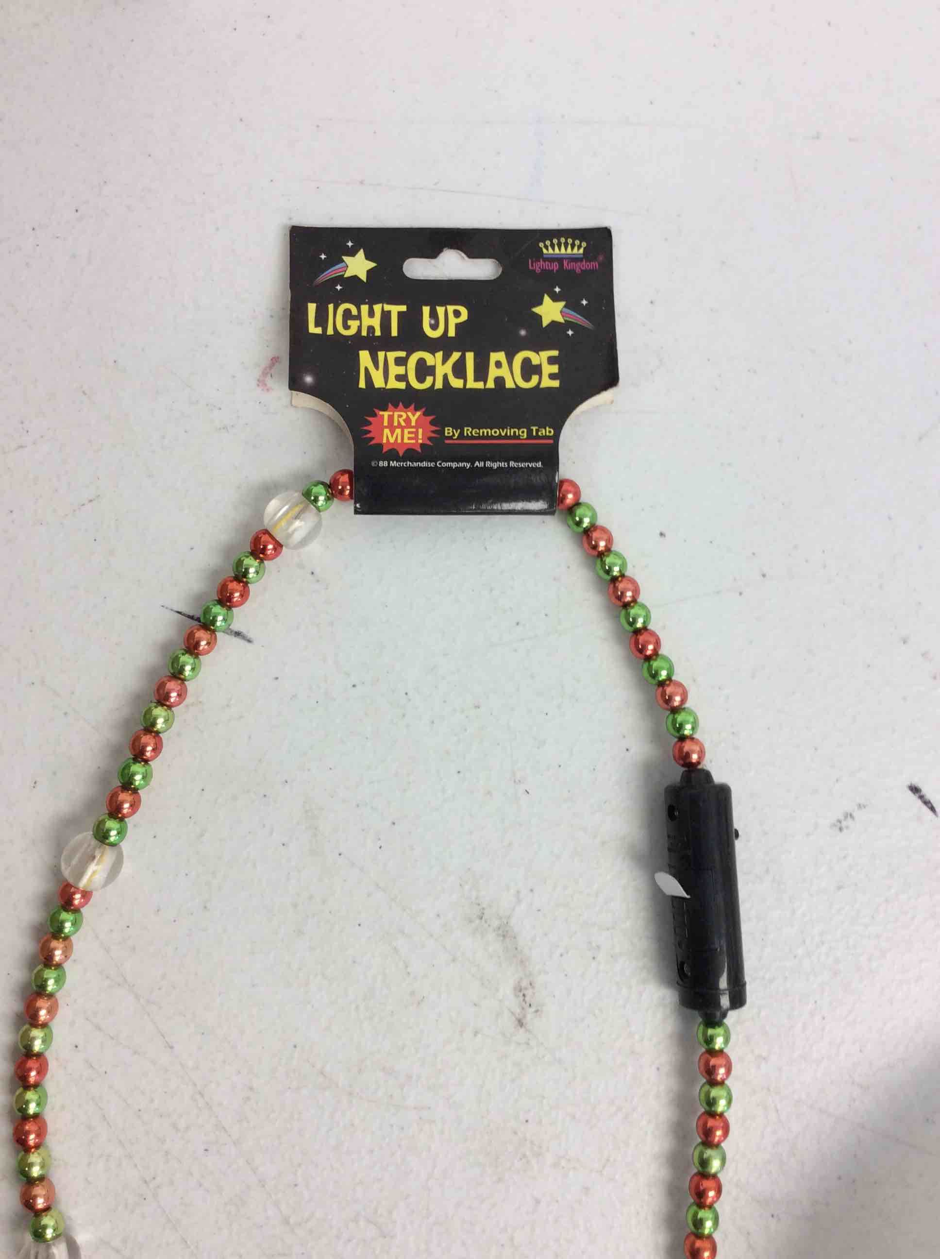 Condition photo showing New/Like New for box of light up necklace 