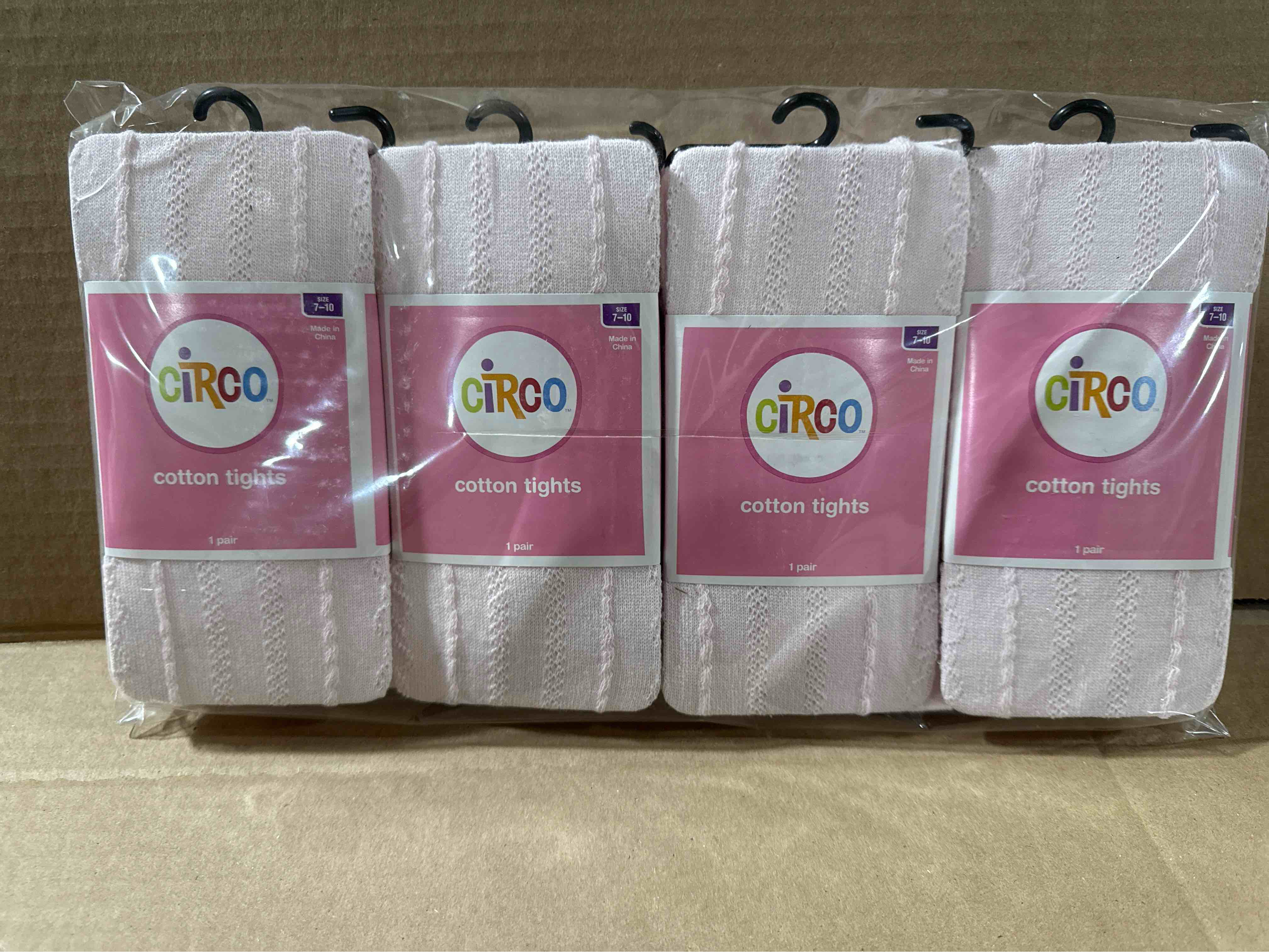 Condition photo showing New/Like New for pack of 4 size 7-10 circo sweater tights - pink