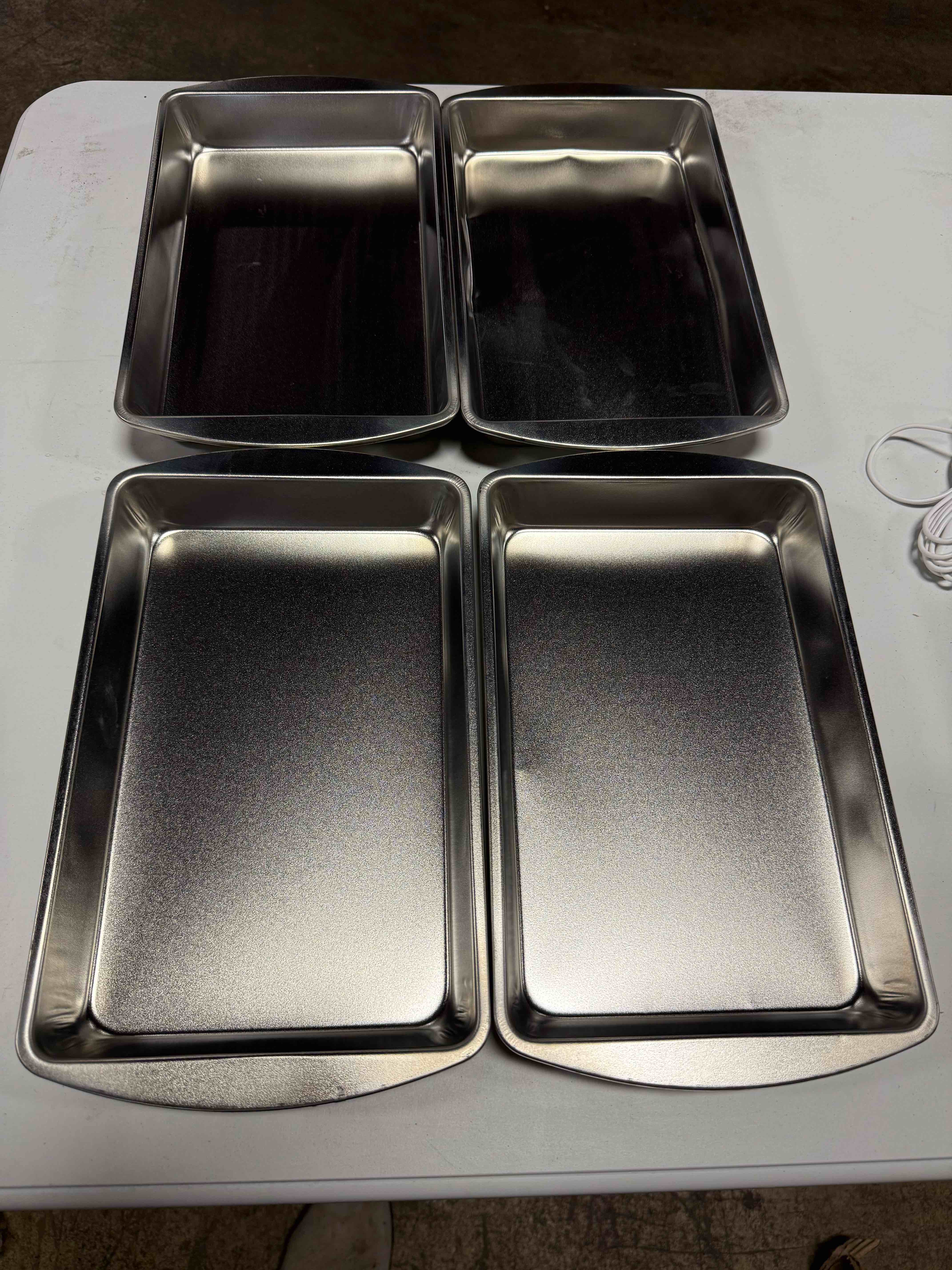(4) 10”x7” brownie pans 