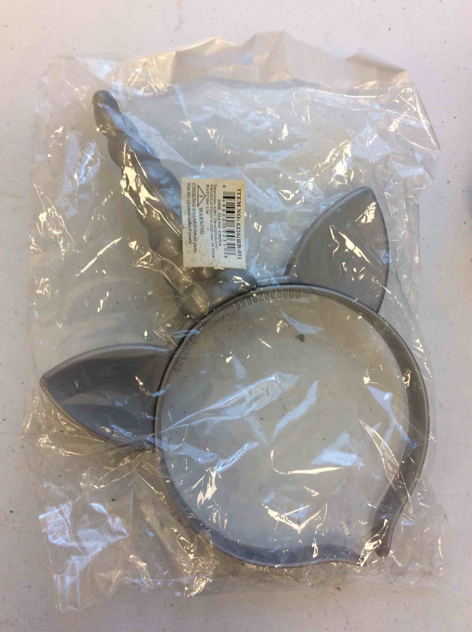 Condition photo showing New/Like New for unicorn headband (color may vary)