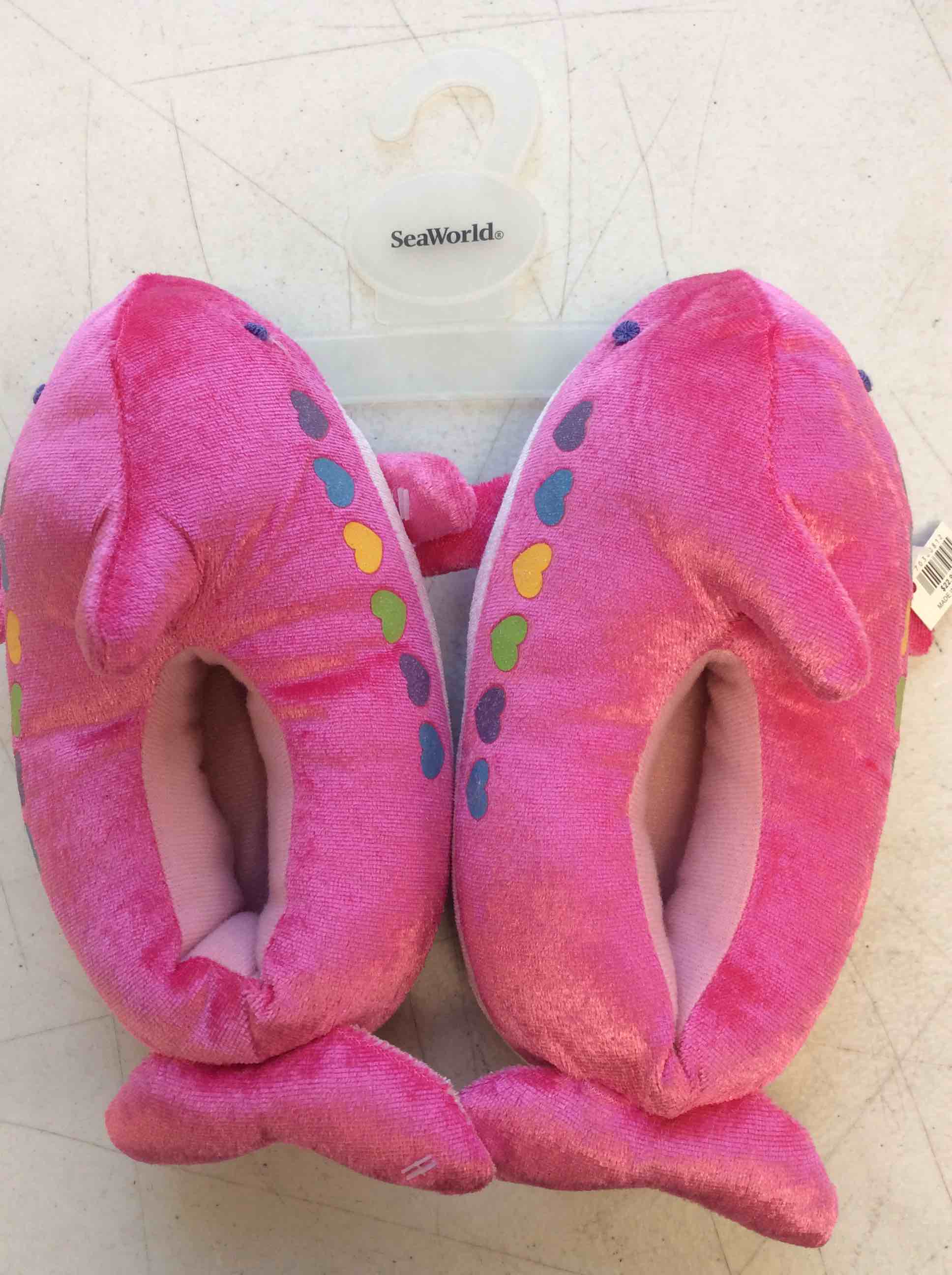 Condition photo showing New/Like New for seaworld kids s/m pink dolphins slippers