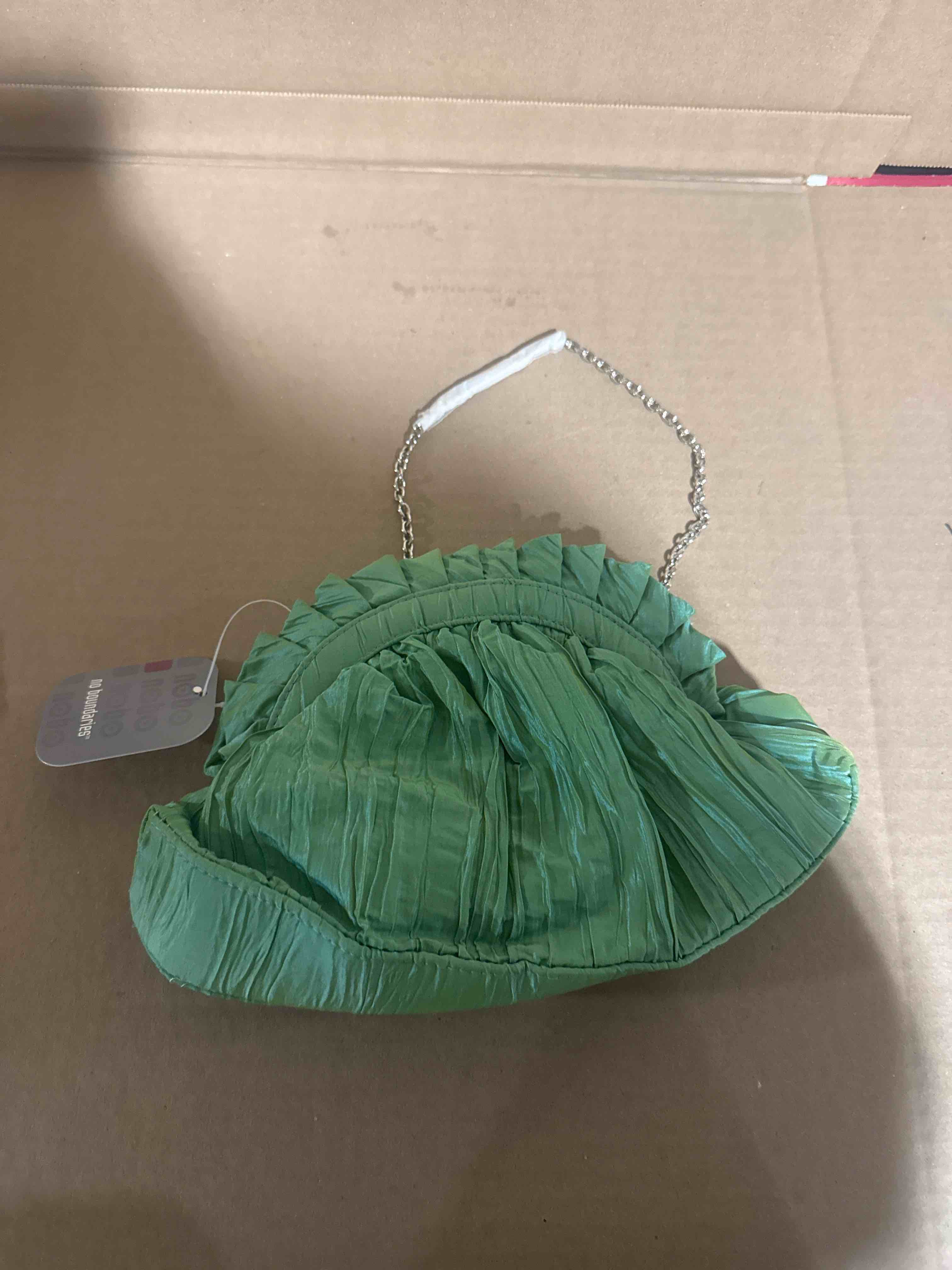 Condition photo showing Brand New for no boundaries green evening bag