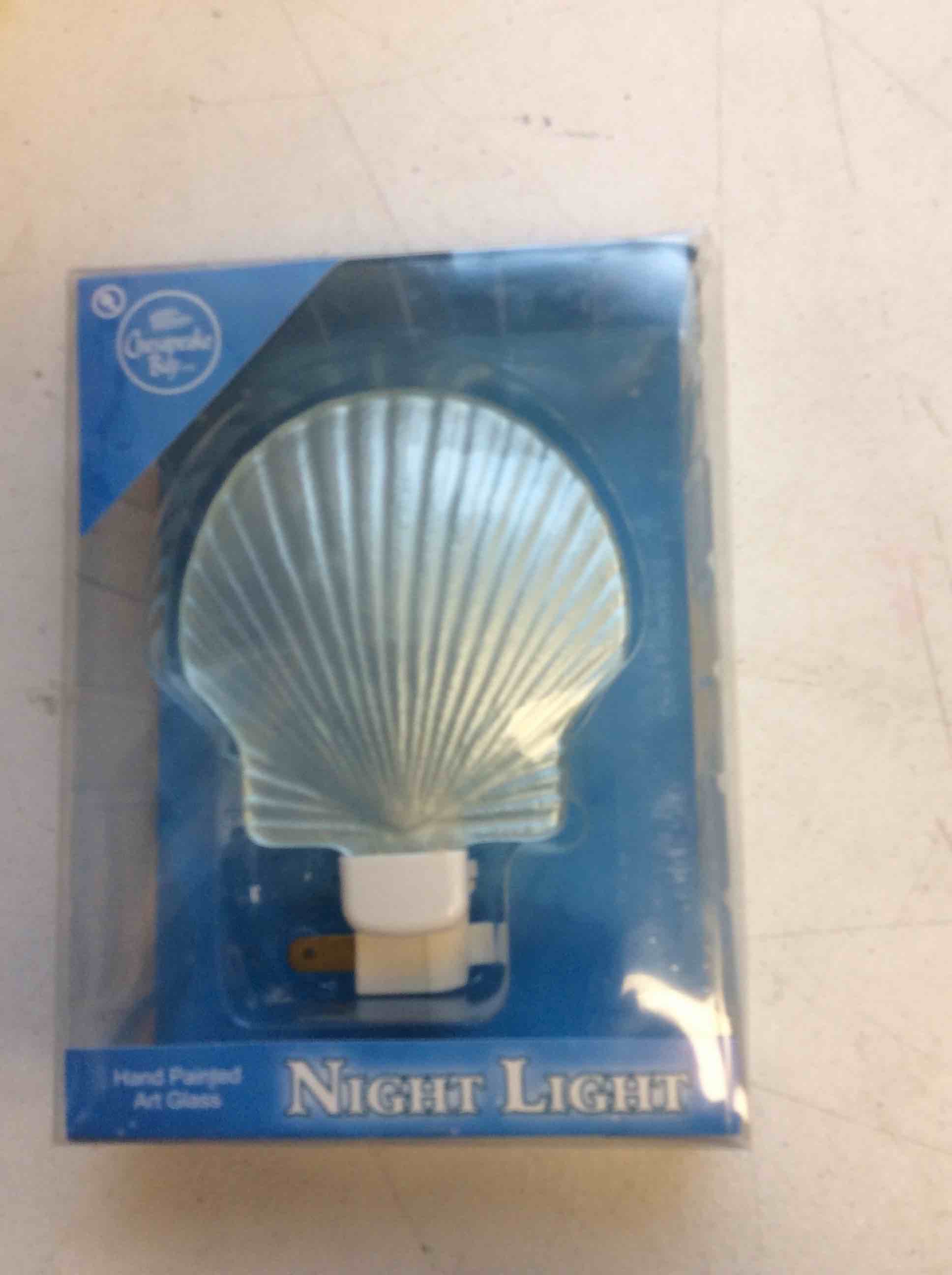 Condition photo showing New/Like New for multi color shell night light