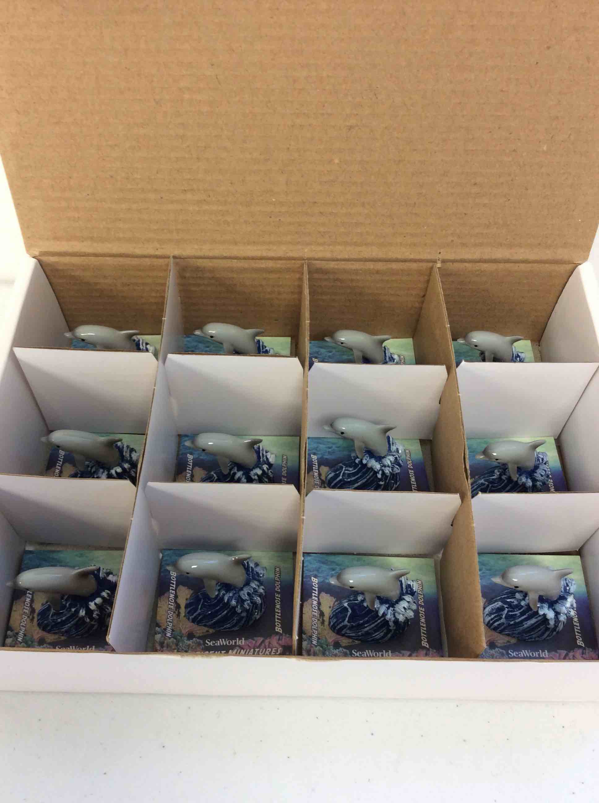 Condition photo showing New/Like New for sea world resin figurines bottlenose dolphin 12 pcs