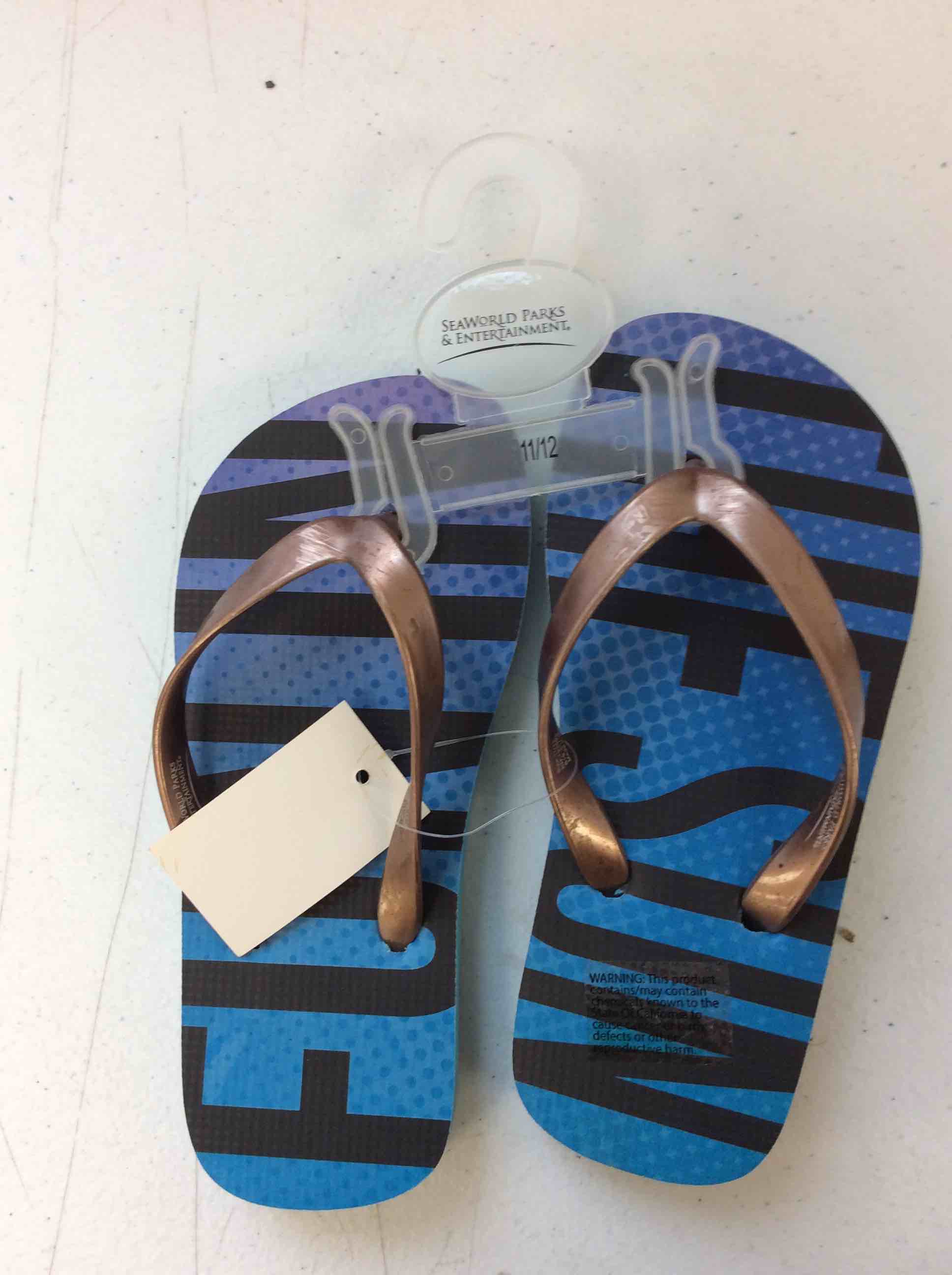 Condition photo showing New/Like New for seaworld wp vl funsun sandals size 11/12