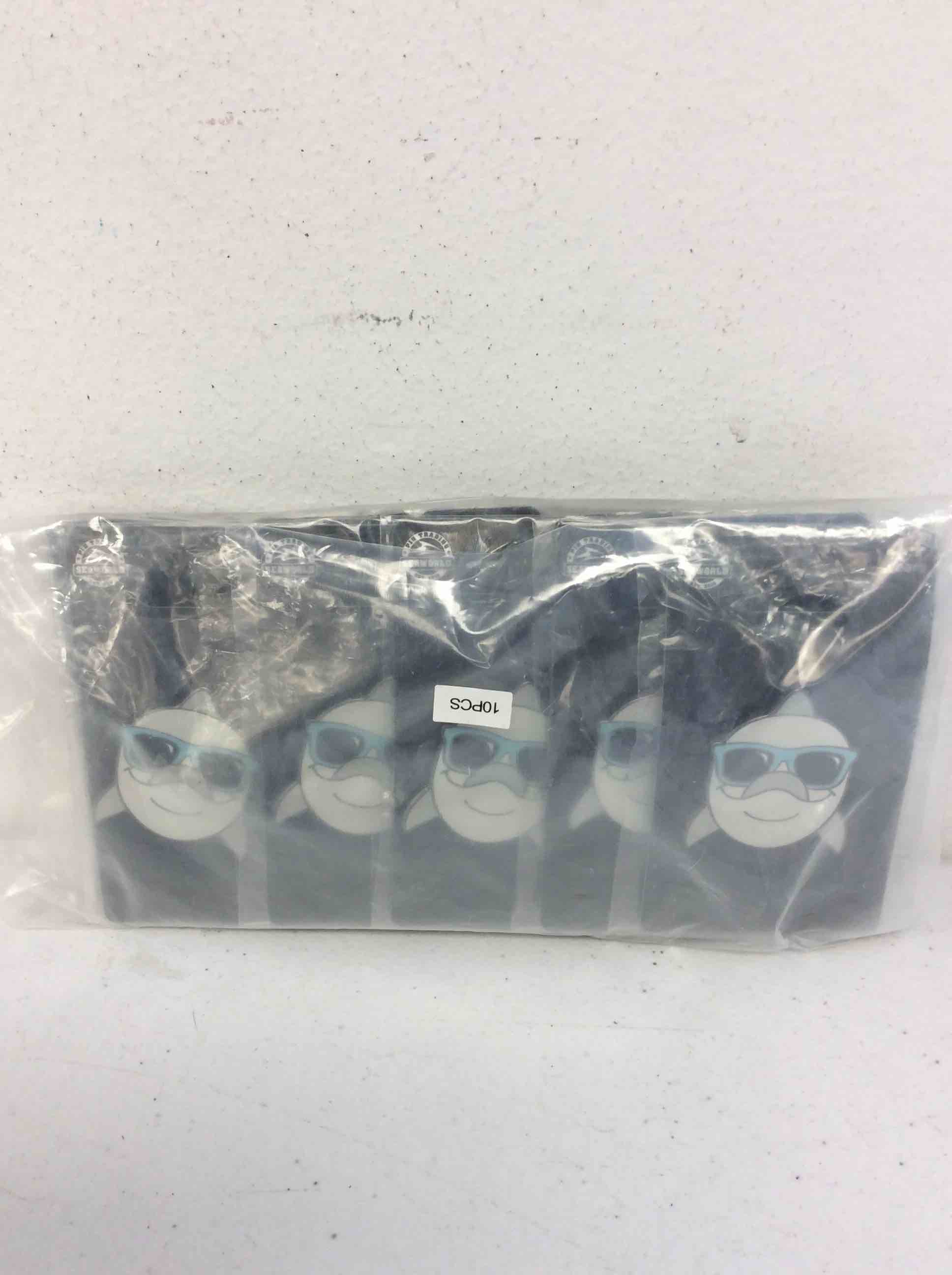 Condition photo showing New/Like New for sea world dolphin pins 10 pcs