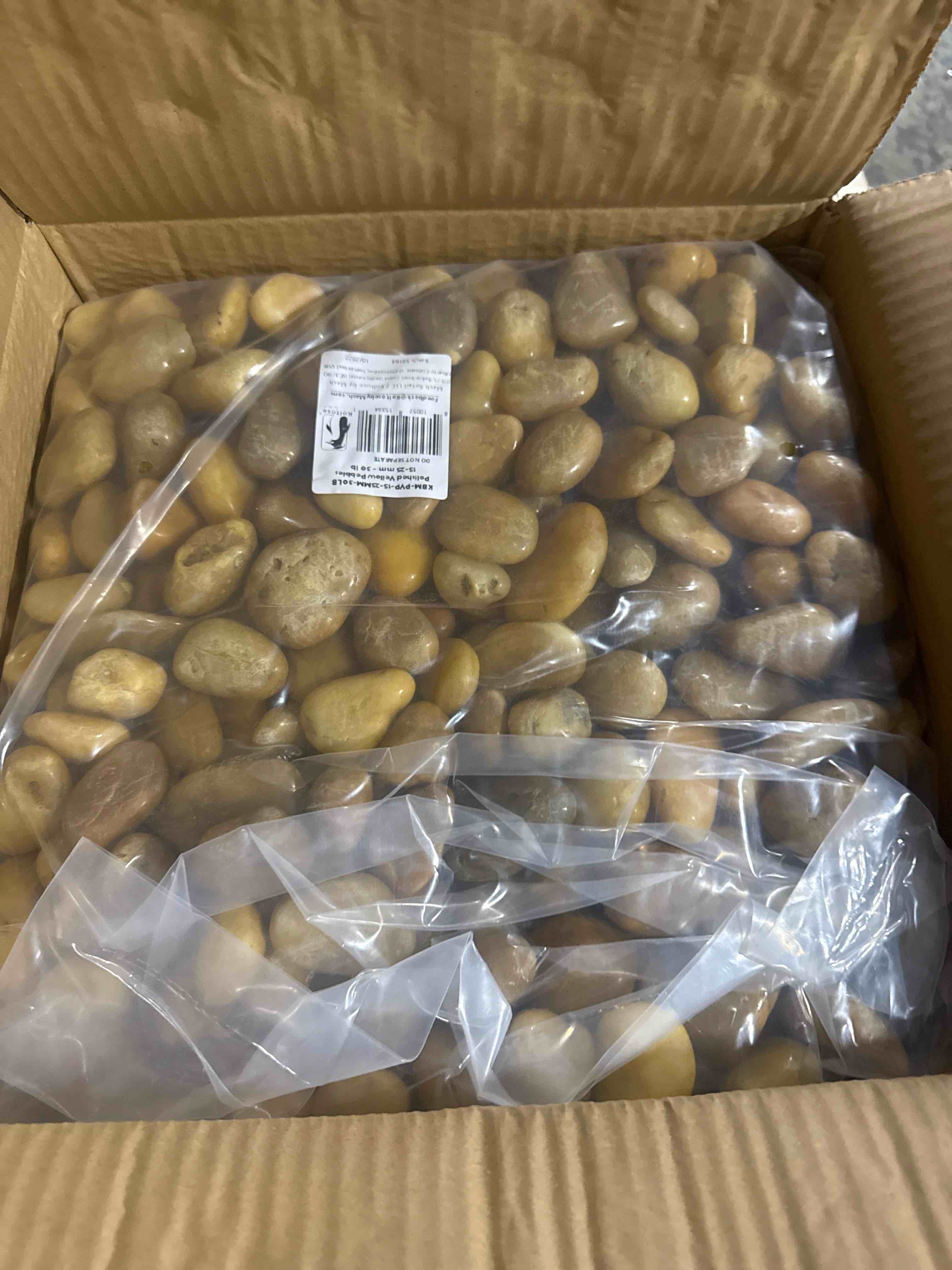 Condition photo showing New/Like New for polished yellow pebbles 30lb