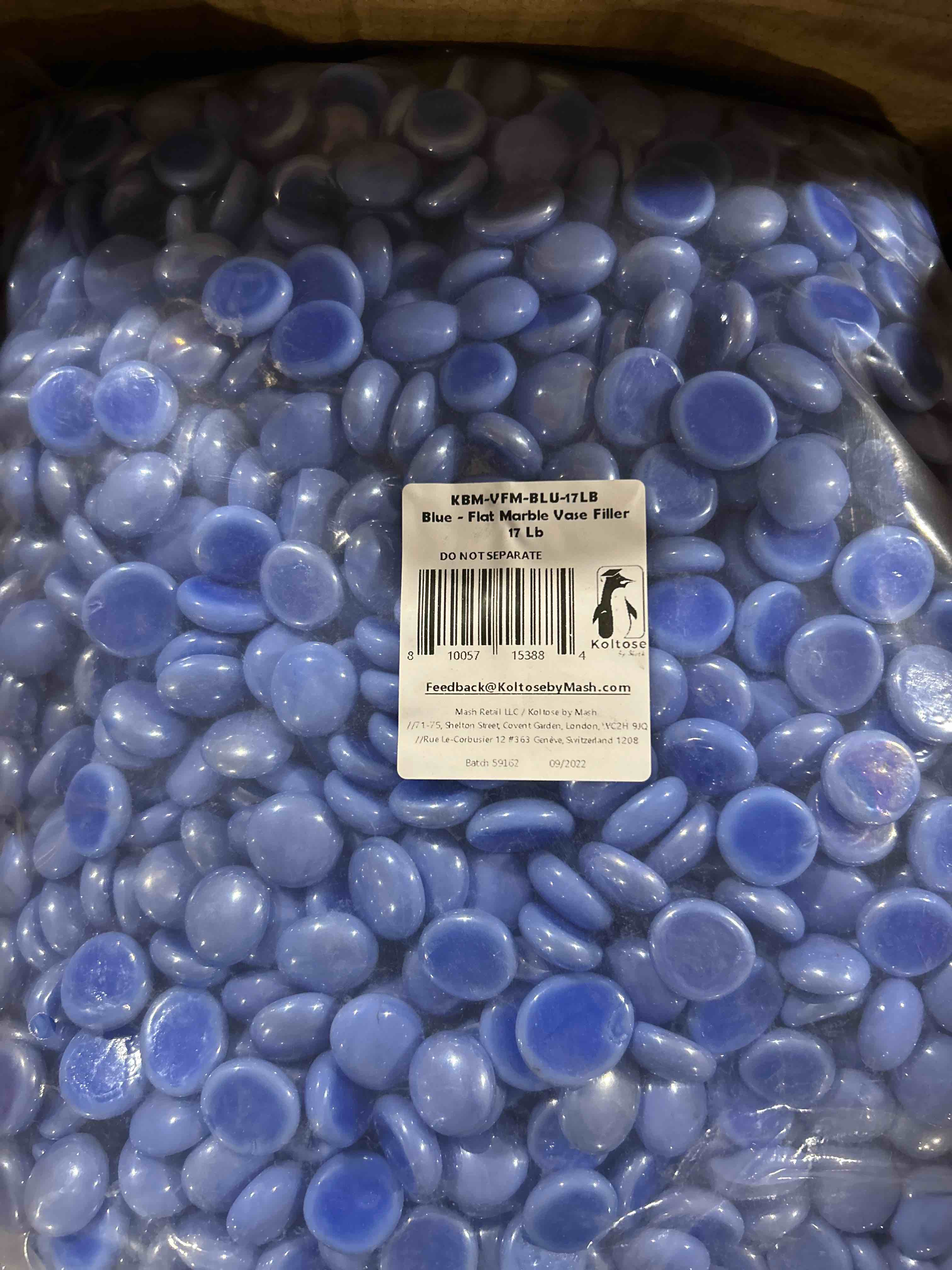17 pounds of flat marbles blue