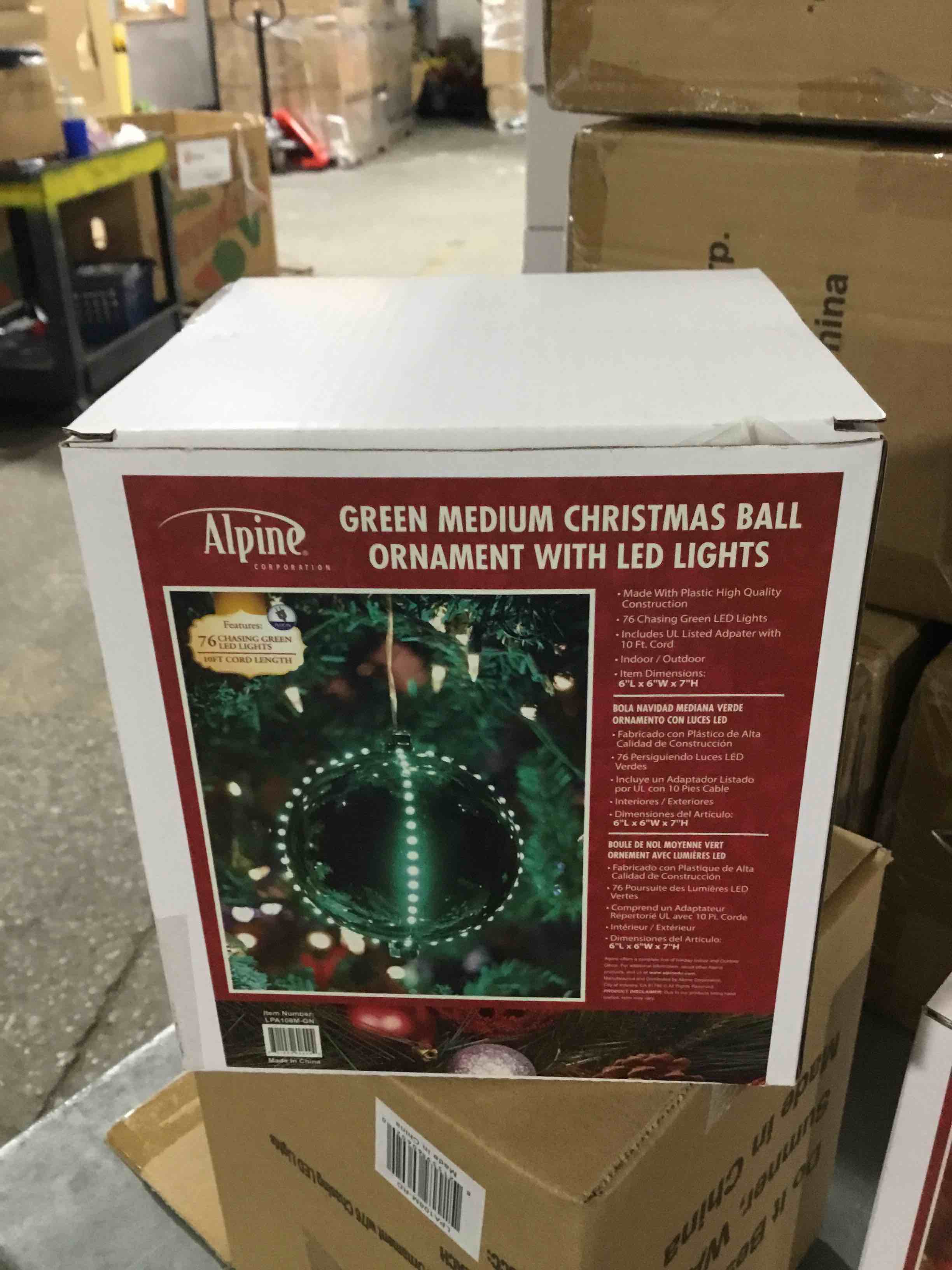 Green, medium Christmas ball ornament with LED lights