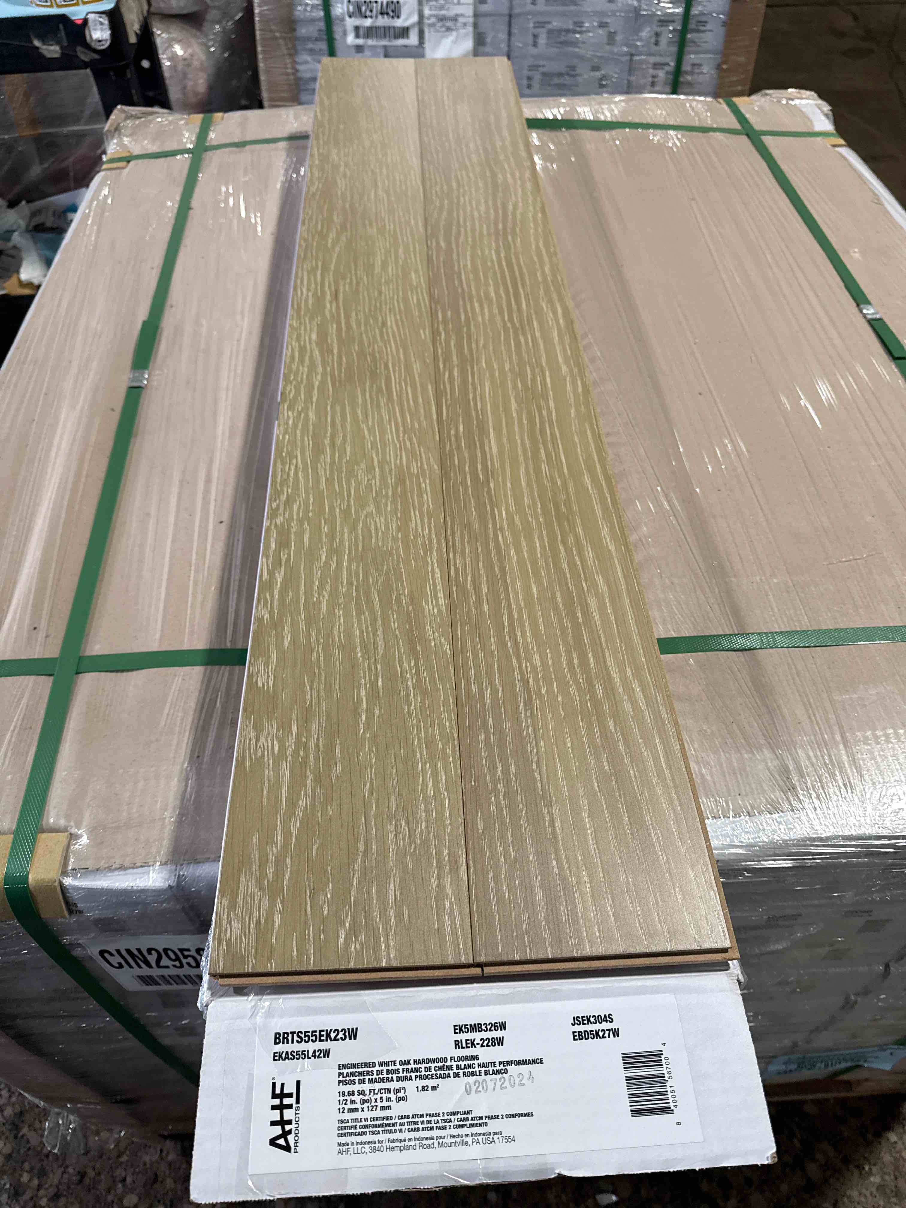 Condition photo showing New/Like New for taupe white oak engineered 12mm 1/2” x 5” hardwood flooring 19.68 sq ft / box -36 boxes - bid per sq ft