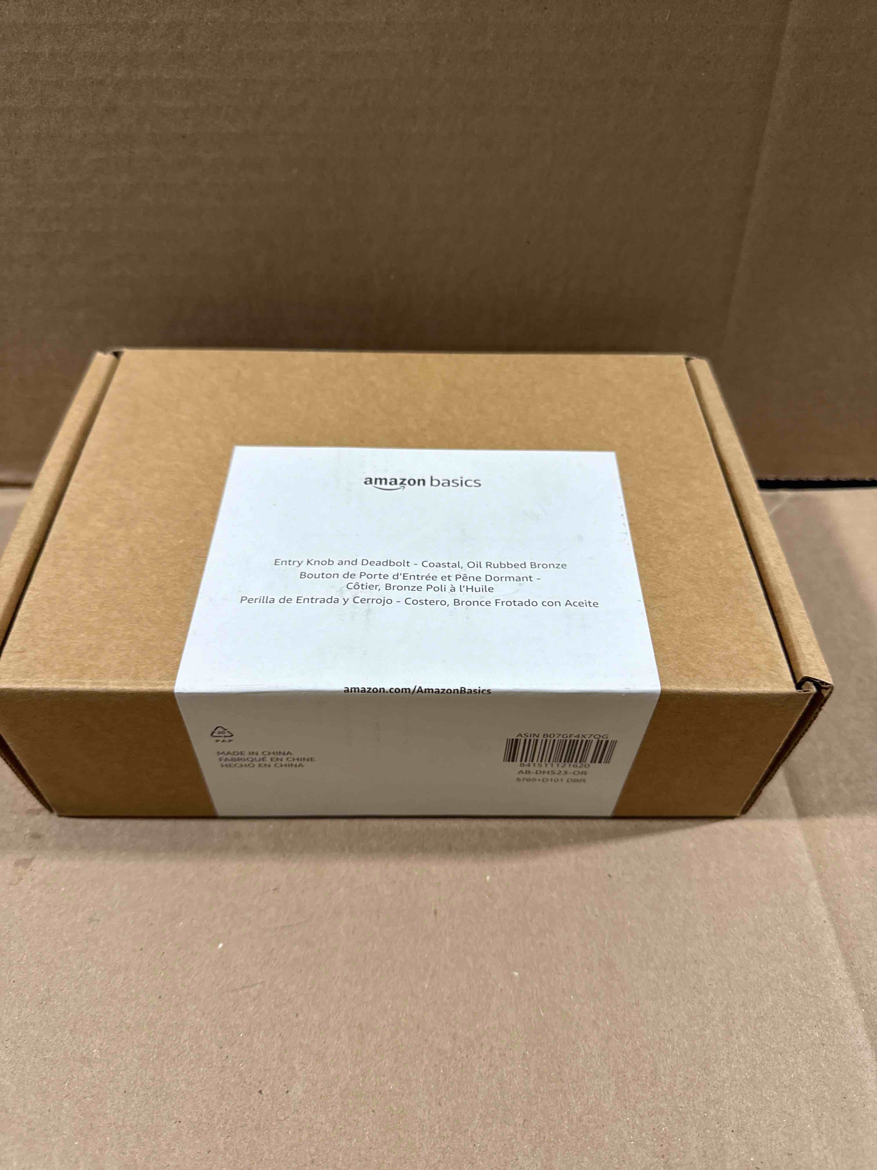 Condition photo showing New/Like New for Amazon Basics Exterior Door Knob With Lock and Deadbolt, Coastal, Oil Rubbed Bronze